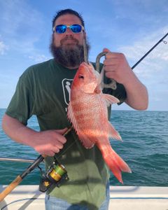 A person fishing in FL