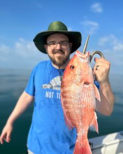 Person fishing with rod in Port Orange, Florida