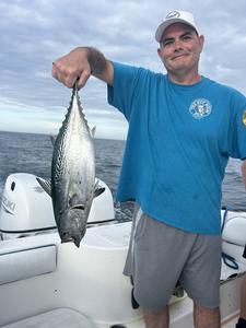 Reeled in a feisty Little Tunny on a partly cloudy day with storms possible!