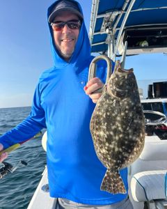 Southern flounder caught fishing in Port Orange FL displayed on boat deck