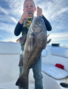 Angler holding a 29-inch fish in FL