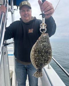 Summer flounder caught fishing in Port Orange FL displayed on boat