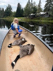Lone angler hunting for fish in Maine