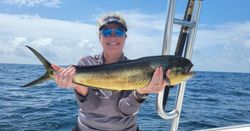 An angler with a big fish caught in Destin