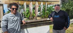 Five spotted weakfish, redfish, and coho salmon caught in FL