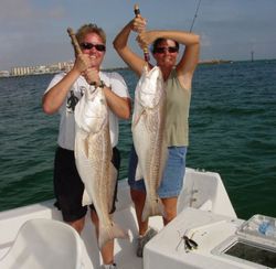 Two anglers with a great catch of fish in Destin