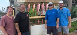 Red snapper fishing catch displayed on cleaning station in Destin FL