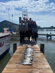 Seven anglers enjoying a fishing trip in VA