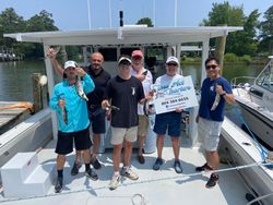 6 anglers fishing on the shores of Gwynn Island