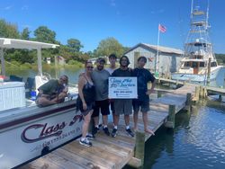 6 people enjoying a day of fishing on Gwynn Island