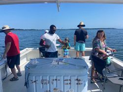Two people enjoying fishing on Gwynn Island