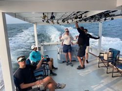4 people fishing on Gwynn Island
