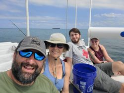 Four people fishing at Gwynn Island