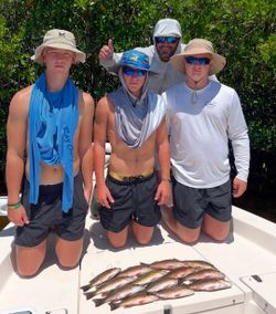 Four people fishing in Florida