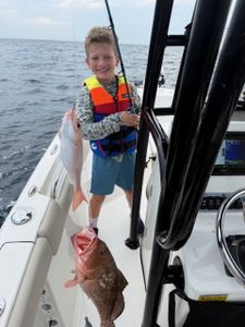 Angler with two fish in Panama City