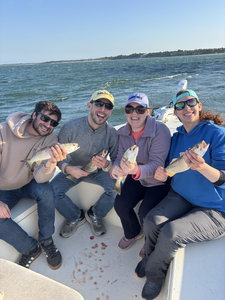 A great day on the water with the crew, reeling in some good catches.