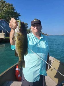 Angler with a huge 22-inch fish caught in Algonac while fishing