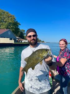 Two people fishing in Algonac