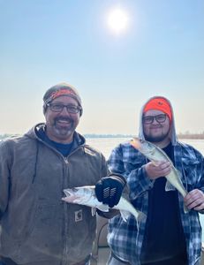 2 people fishing in MI