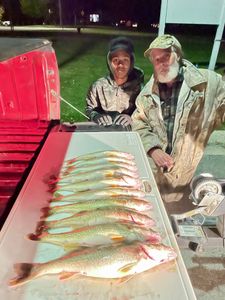 3 anglers fishing in MI with 2 big fish
