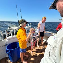 3 people fishing with rod and reel in Florida