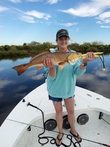 The thrill of reeling in a red drum in Louisiana.