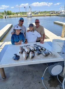 4 people fishing in Barataria