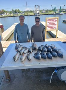Two people fishing in Barataria