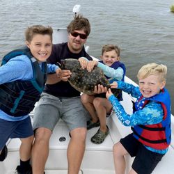 Happy Kiddos with their flounder catch! - Manns Harbor, NC.