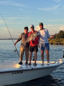 Three people fishing in LA
