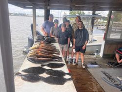 Seven anglers enjoying a great fishing trip in Lafitte