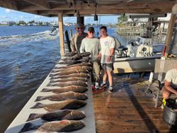 Two people fishing in LA