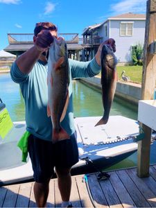 Two anglers fishing in TX
