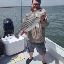 Hooked a feisty striped bass on this epic fishing adventure!