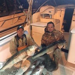 Two people fishing in Neptune