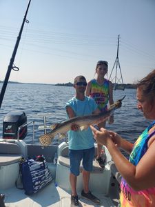 Three people enjoying fishing cruises and tours in Florida
