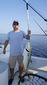 Fisherman with a catch in the waters of Gulf Breeze