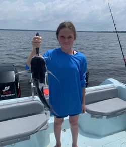 Lone angler fishing in the Gulf Breeze