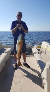 A person on a fishing cruise in Gulf Breeze