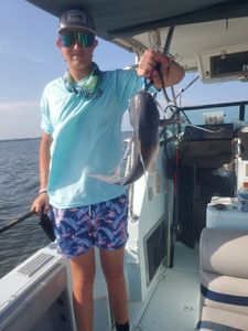 Man enjoying a fishing cruise in Gulf Breeze