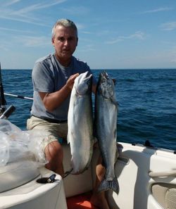 Reeling in a trophy salmon on Lake Ontario! 