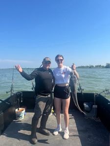 Two anglers fishing in Port Clinton