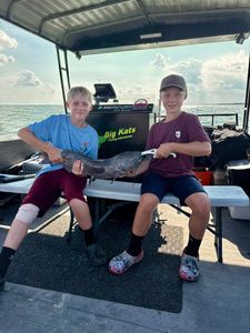 Two anglers fishing in Port Clinton