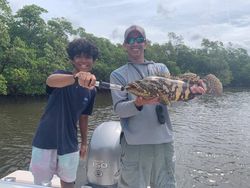 Couple enjoying a day of fishing in Naples