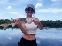 A person fishing in FL