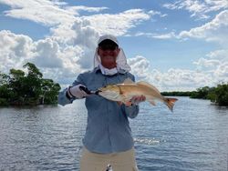 A person fishing in Naples, Florida