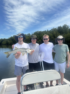 A massive Snook caught on a fishing trip with friends!