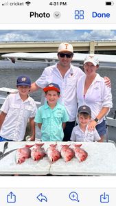 Five people fishing in Pensacola