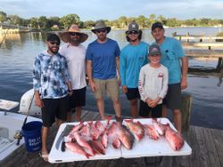 Group of six people fishing in Pensacola