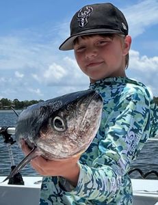 A person fishing in Pensacola